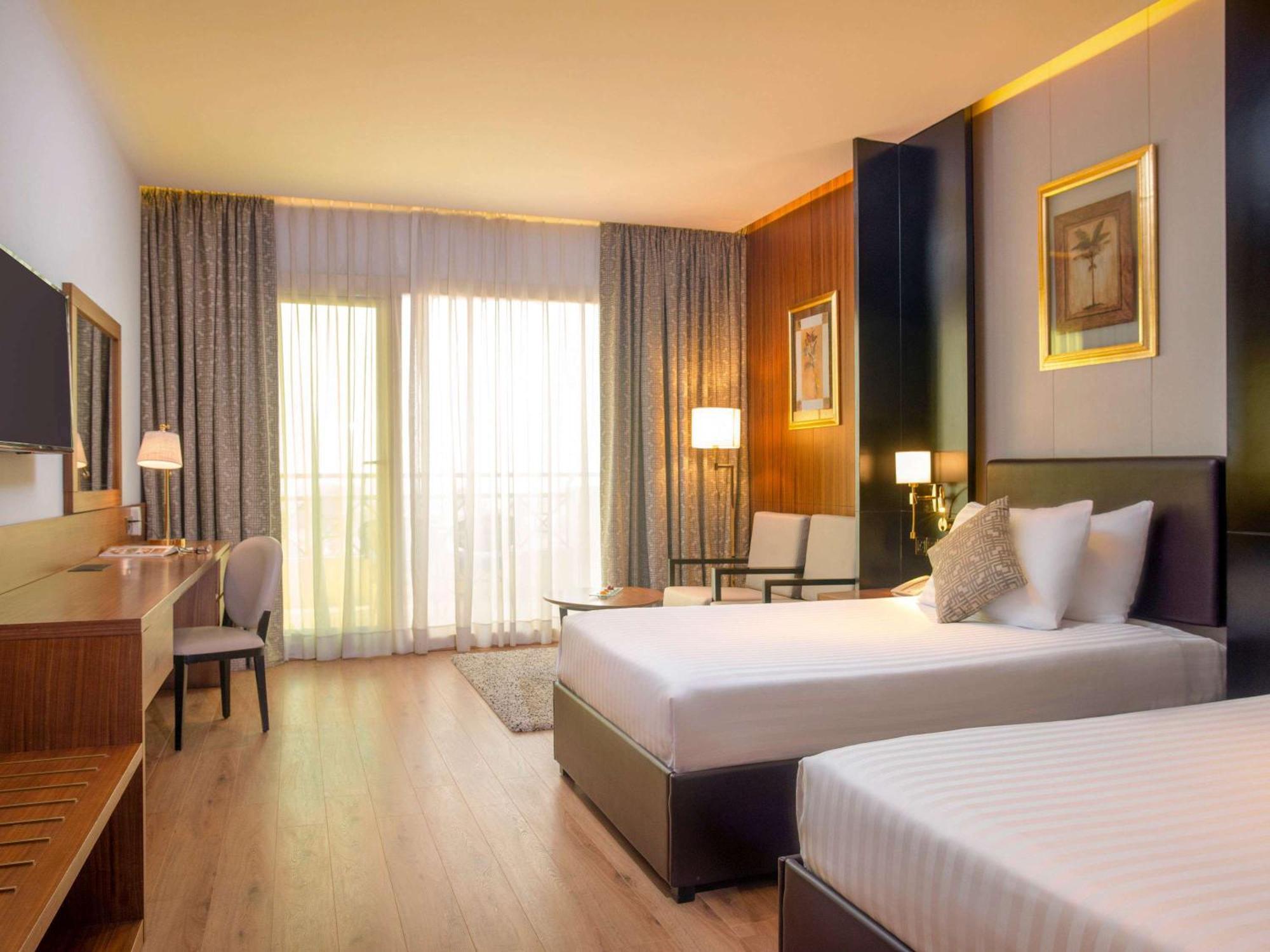 Moevenpick Hotel Cairo - Media City Giza Extérieur photo Deluxe Room
