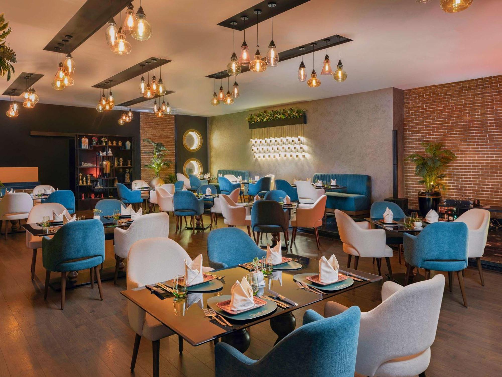 Moevenpick Hotel Cairo - Media City Giza Extérieur photo The restaurant